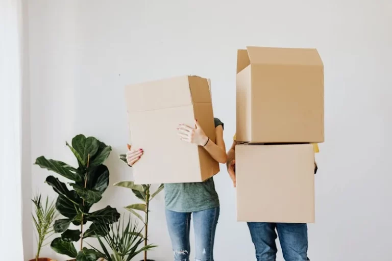 A couple of people are boxing with their hands